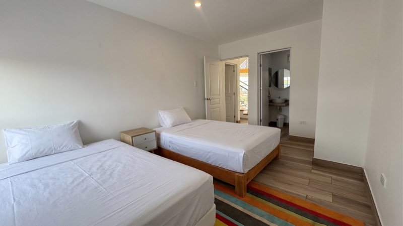 Habitación 1 del primer piso con dos camas y baño propio